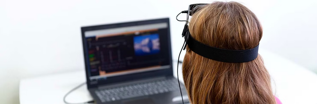 How can neurofeedback devices enhance brain activity?